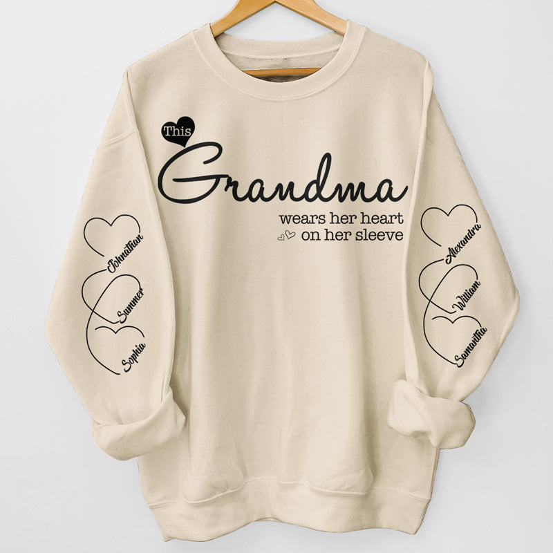 Discover Grandma Wears Her Heart On Her Sleeve - Family Personalized Custom Unisex Sweatshirt With Design On Sleeve - Christmas Gift For Mom, Grandma
