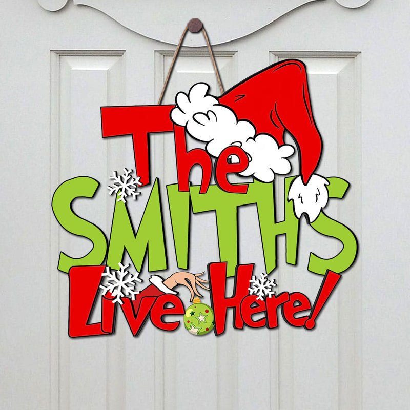 Discover The Family Lives Here Christmas Personalized Wooden Door Hanger